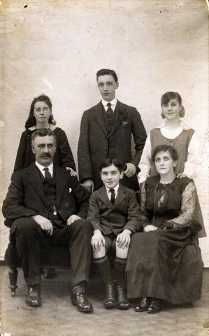 Black and white portrait of family 