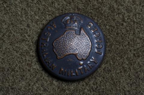 Image depicts medal that says 'Australian Military Forces' with a map of Australia in the middle.