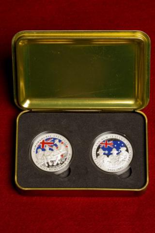Picture of un-circulated coins in a case.